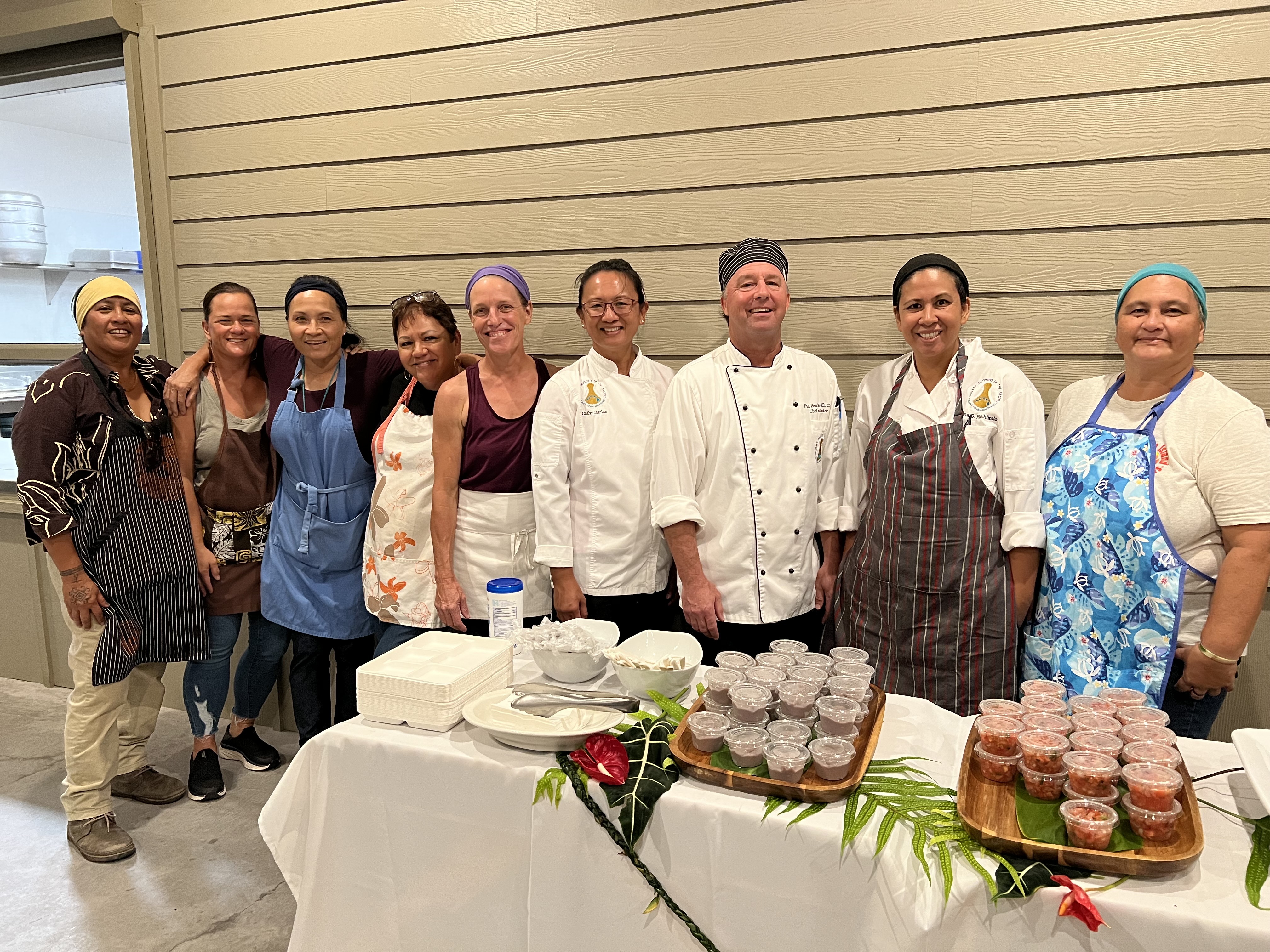 Students celebrate the completion of a culinary training program during a ho'ike. 