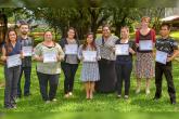 group photo with certificates