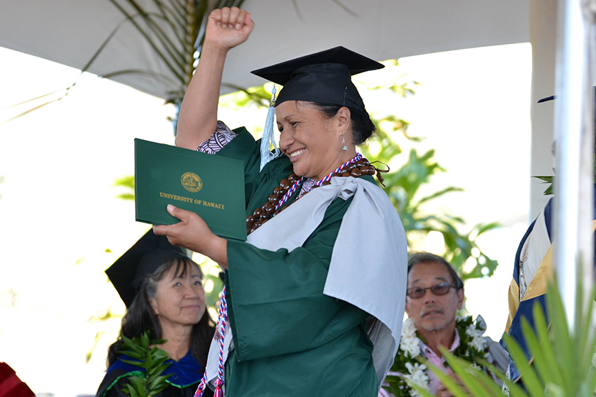 Student with diploma