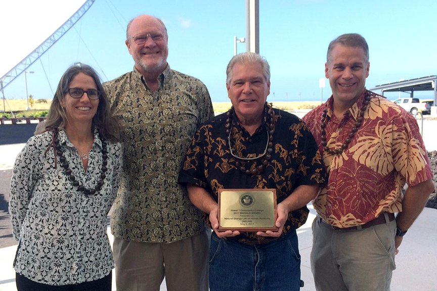 Hawai'i CC – Pālamanui Director Marty Fletcher, second from left, presents the Mahalo Award to representatives of NELHA.