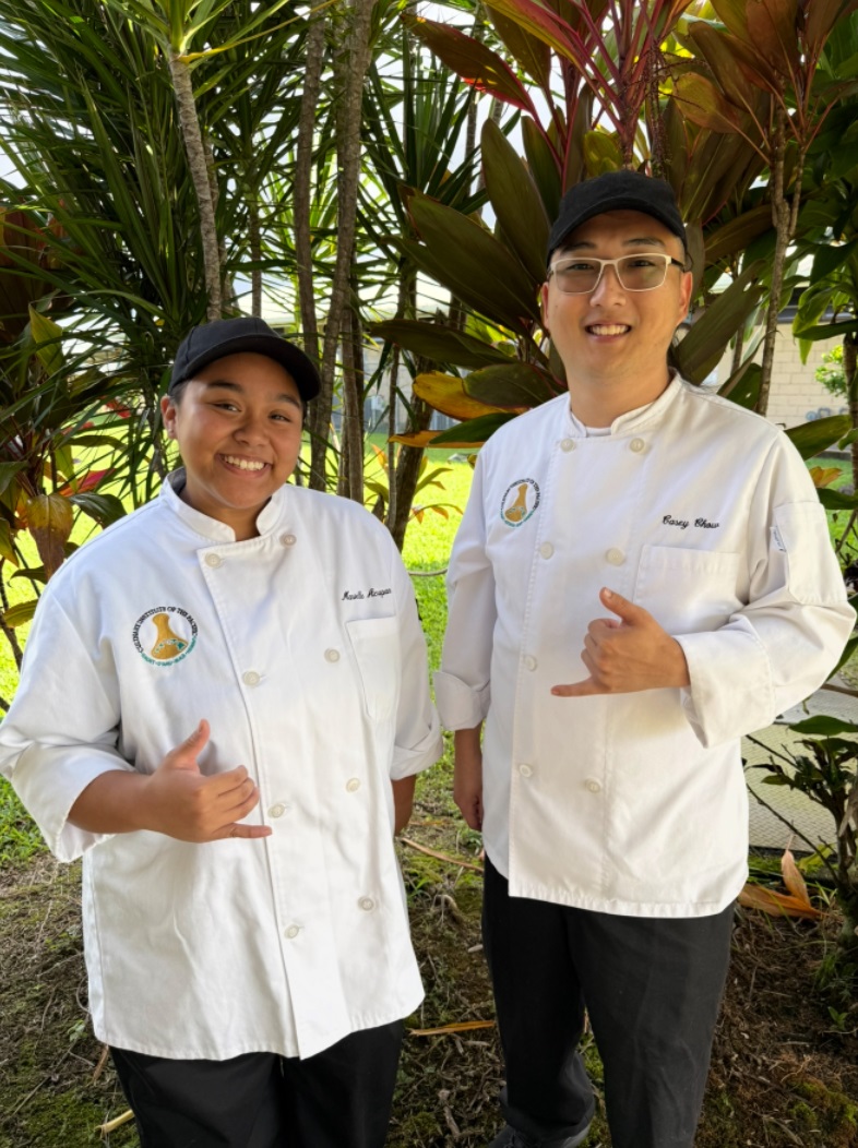 Second-year Hawai'i CC Culinary Arts student Marielle Acupan (left) and first-year Culinary Arts student Casey Chow (right) are among the 20 Culinary students who received scholarships this year funded by the Japanese Chamber of Commerce & Industry of Hawai'i's annual "A Taste of Hilo" event.