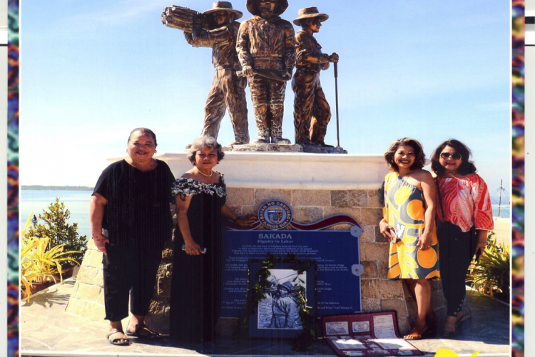 group photo in front of Sakada statute 