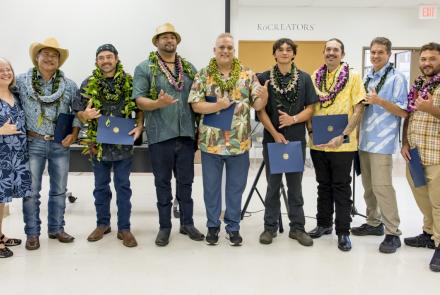 The inaugural class of Hawai‘i Community College’s butchery course with instructor Bill Wong (third from left) and Wade Cypriano (far right), Hawaii CC Chancellor Susan Kazama (far left), Hawaii CC VCAA Kimberley Collins (second from left), and Mayor Kimo Alameda (center). (Photo Credit: Sarah Anderson)