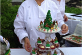 Chef posing with desserts