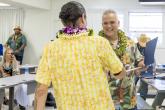 Hawai‘i Island Mayor Kimo Alameda presents student Kawika Bernabe with his graduation certificate. (Photo Credit: Sarah Anderson)