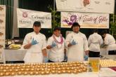 Hawai'i  CC Culinary Program students Shingene Garcia (left) and Alexander Shirota (right) with chef Tori Hiro