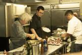 Hawai‘i Community College – Palamanui Culinary Arts Program 2023 graduate, Kai Kale (center) works alongside Chef Mavro (left) at a workshop at the campus June 12. 